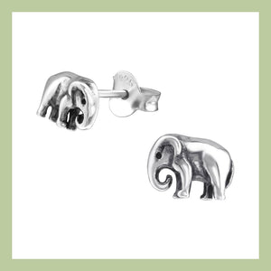 a pair of silver elephant stud earrings on a white background