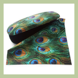 peacock feather design glasses case with lens cloth on a white background