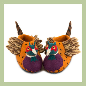 a pair of felted pheasant slippers on a white background