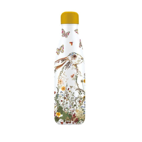 Bottle with a rabbit and floral design on a white background