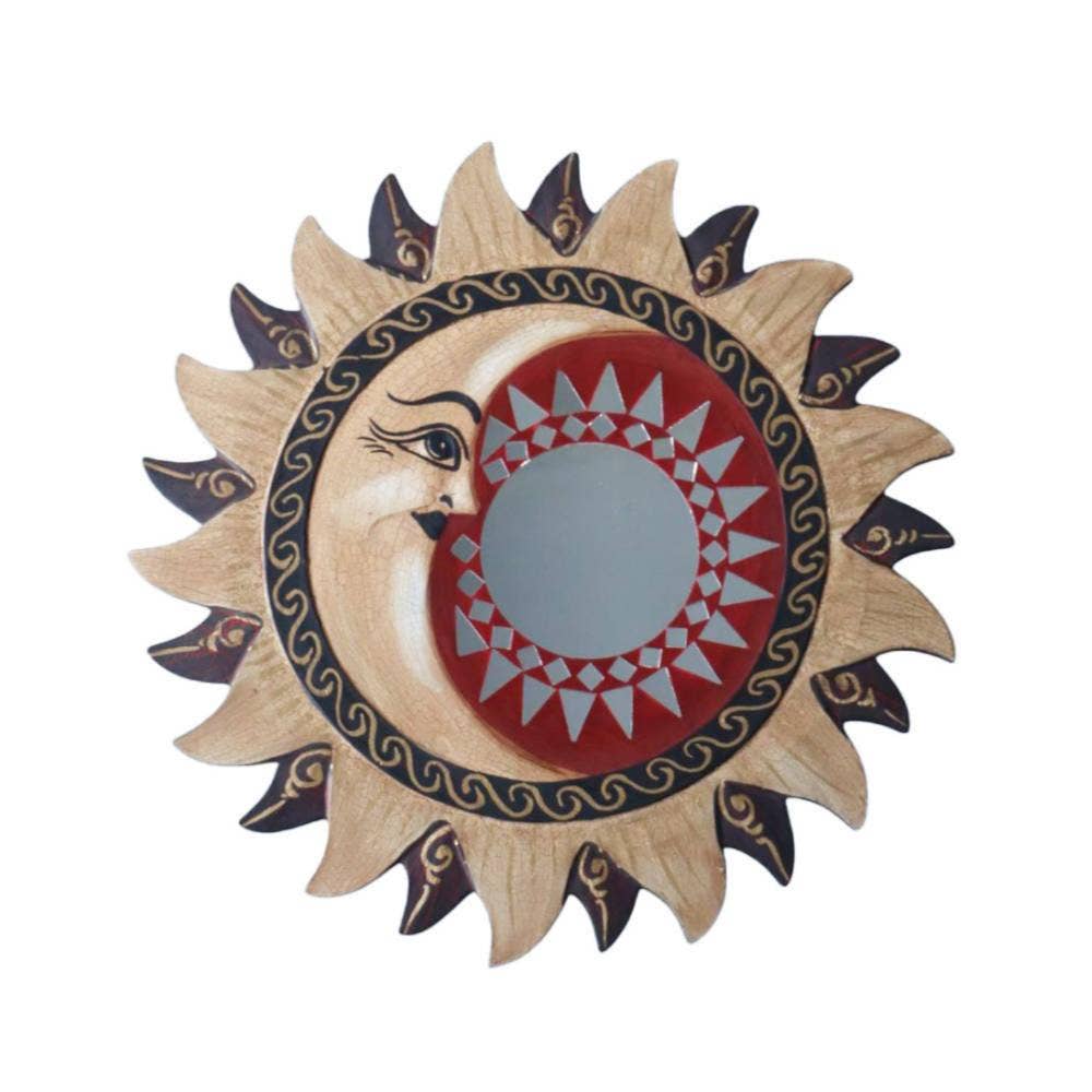 Decorative wall art with sun and moon design on a white background