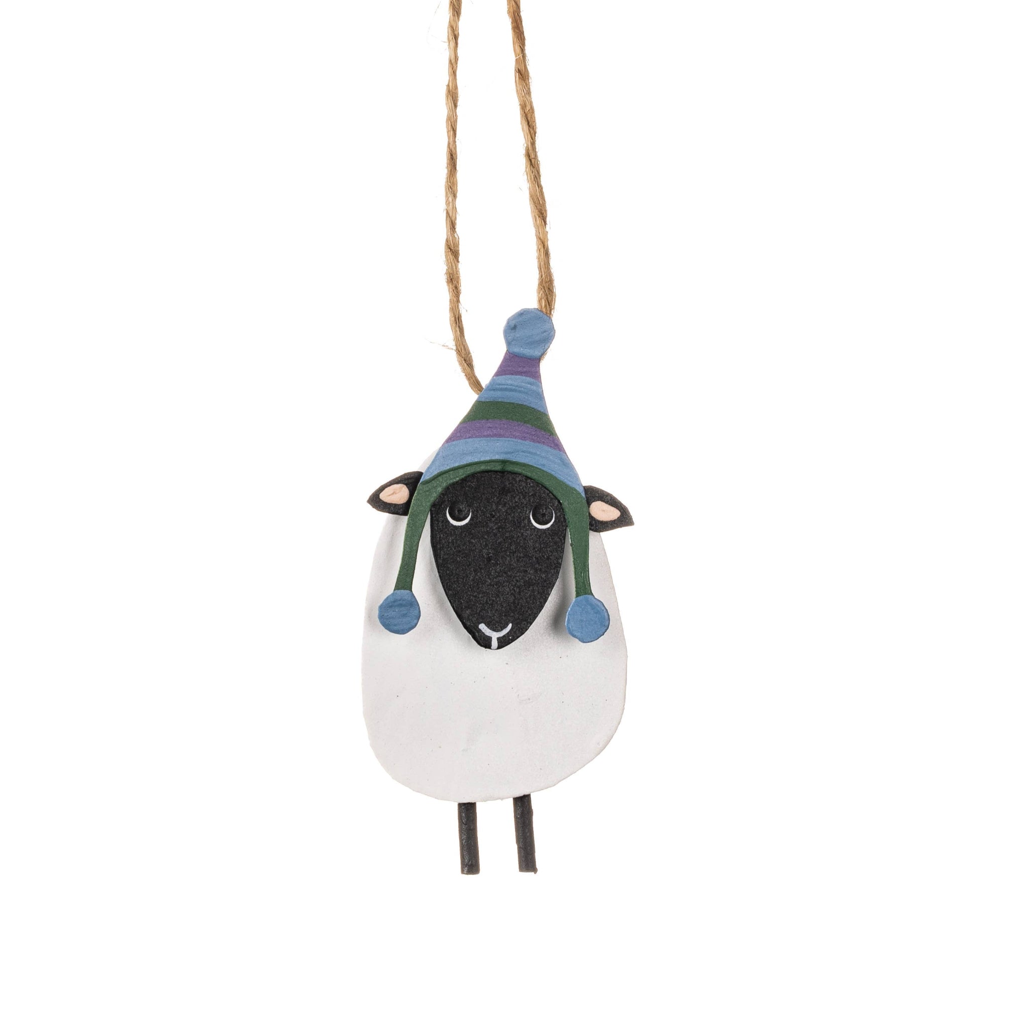 Decorative sheep ornament with a colorful hat on a white background