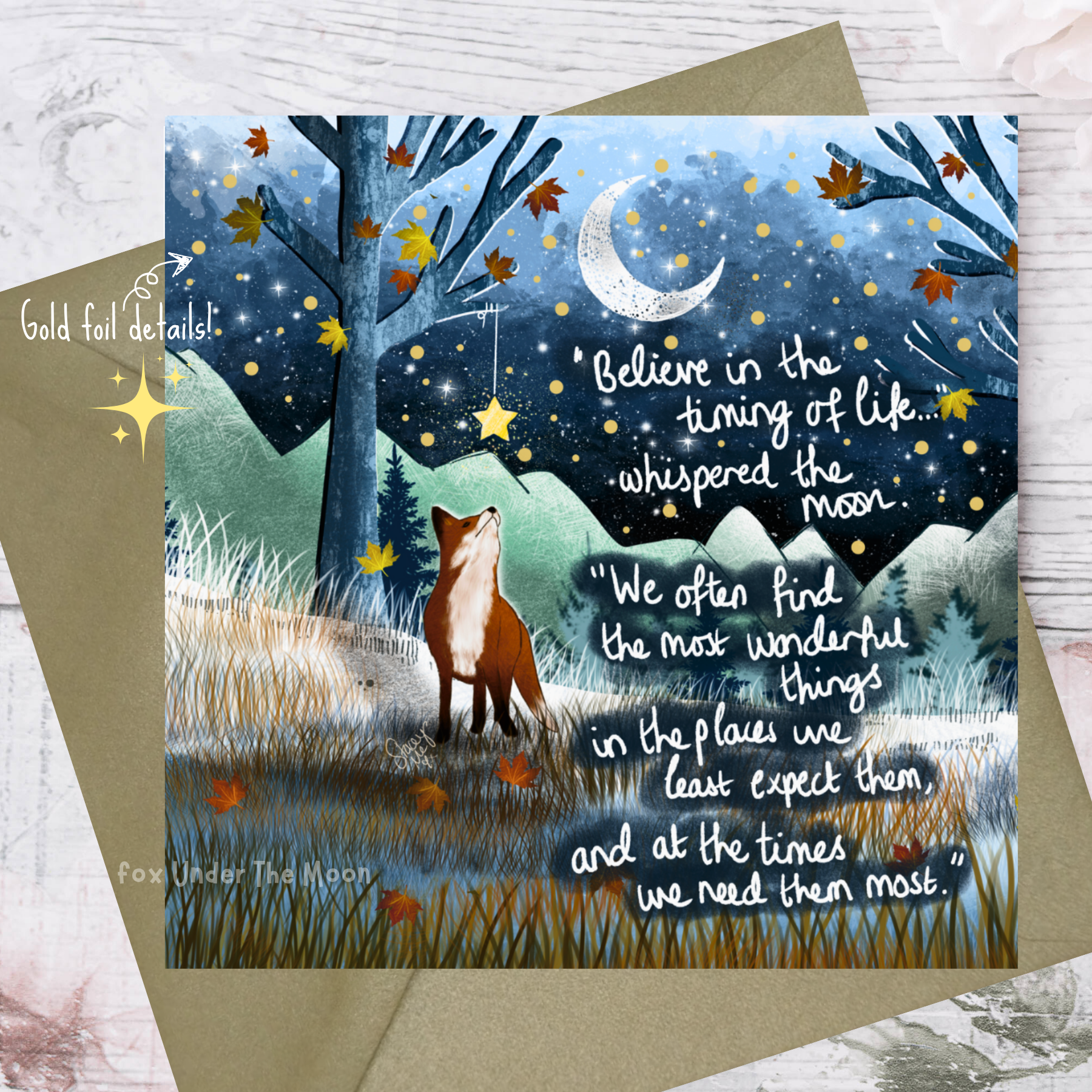 Greeting card with a fox under a moonlit sky, featuring text and gold foil details.