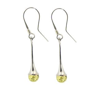 Silver earrings with yellow teardrop-shaped beads on a white background