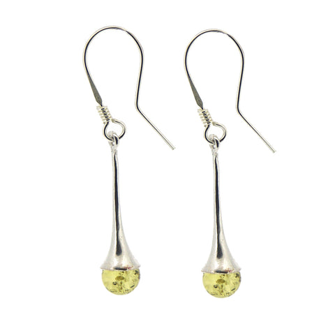 Silver earrings with yellow teardrop-shaped beads on a white background
