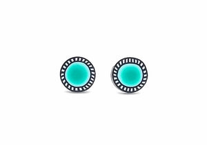 Pair of round earrings with turquoise centers and black and white striped borders on a white background.