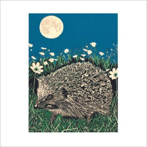 Hedgehog in a grassy field with flowers and a moonlit sky