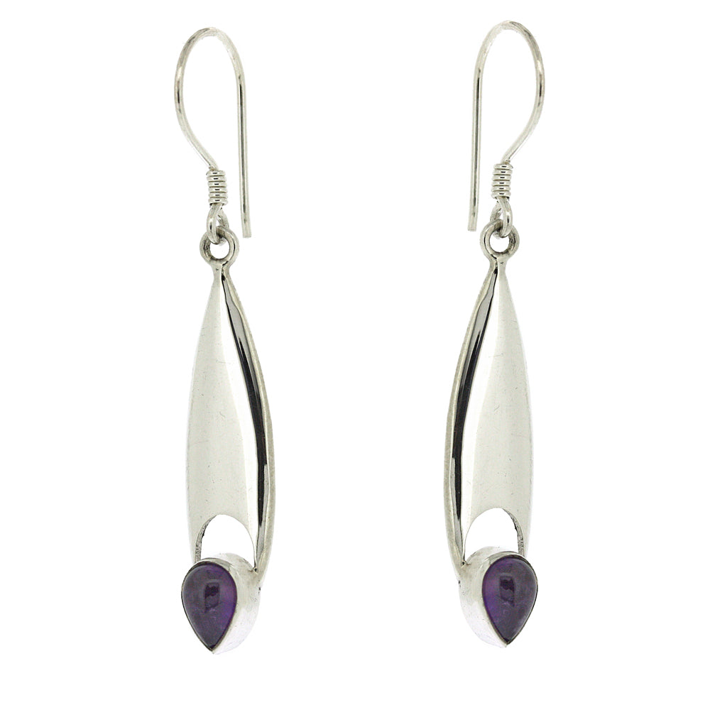 Silver earrings with purple gemstones on a white background