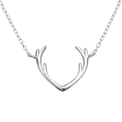 Silver antler-shaped necklace on a white background