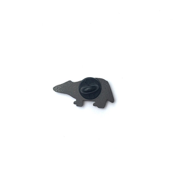 Black bear-shaped object on a white background