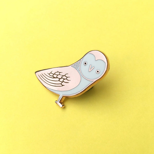 Bird-shaped object on a yellow background