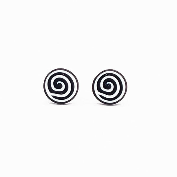 pair of black and white spiral stud earrings on a white background
