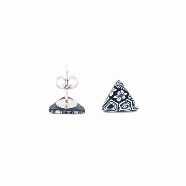 Black and white geometric earrings on a white background