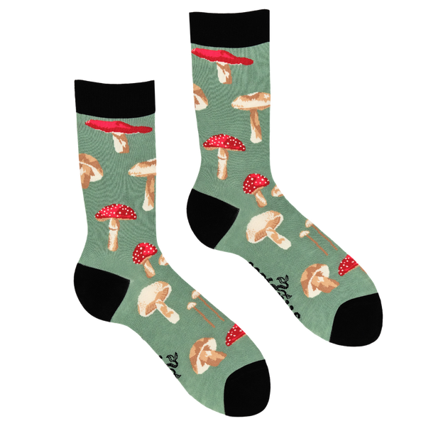 Green socks with mushroom pattern on a white background