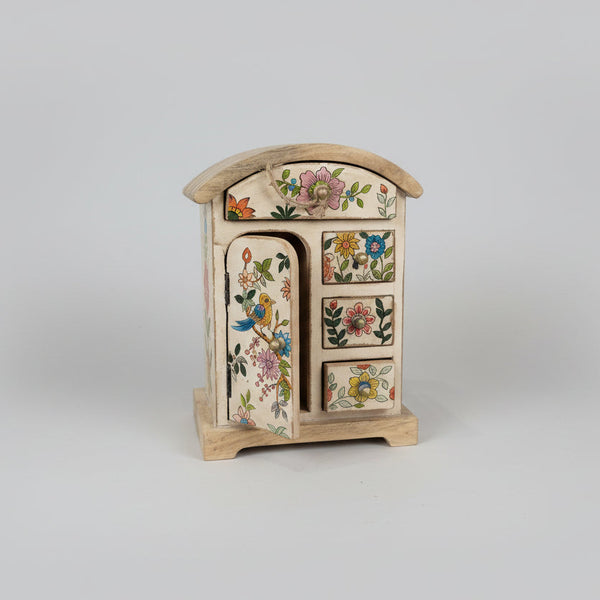 Decorative chest with floral patterns on a gray background