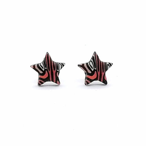 Star-shaped earrings with a red and black pattern on a white background