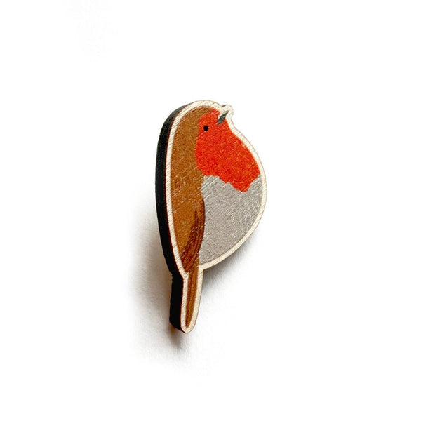 Wooden robin bird pin on a white background