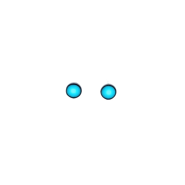 Two blue circular objects on a white background