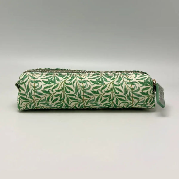 Green leaf-patterned pouch on a light gray background
