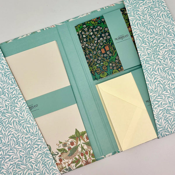 Set of stationery items with floral patterns and 'Morris & Co' branding.