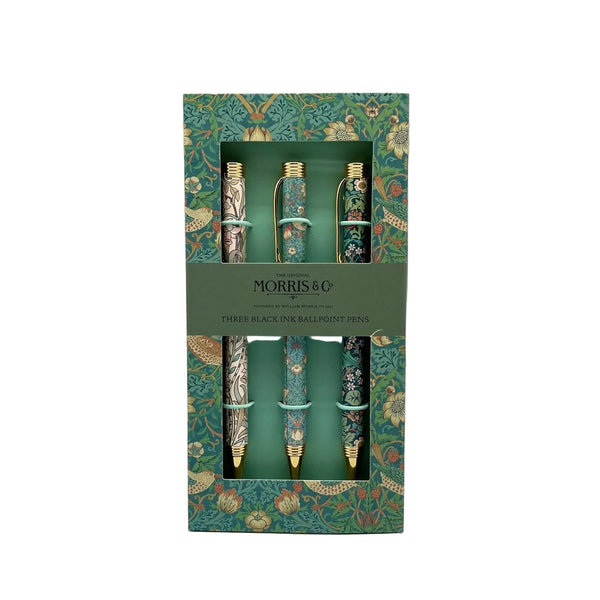 A boxed set of three Morris & Co. black inkballpoint pens with ornate floral and bird engravings, presented in a decorative green patterned box with a central paper band.
