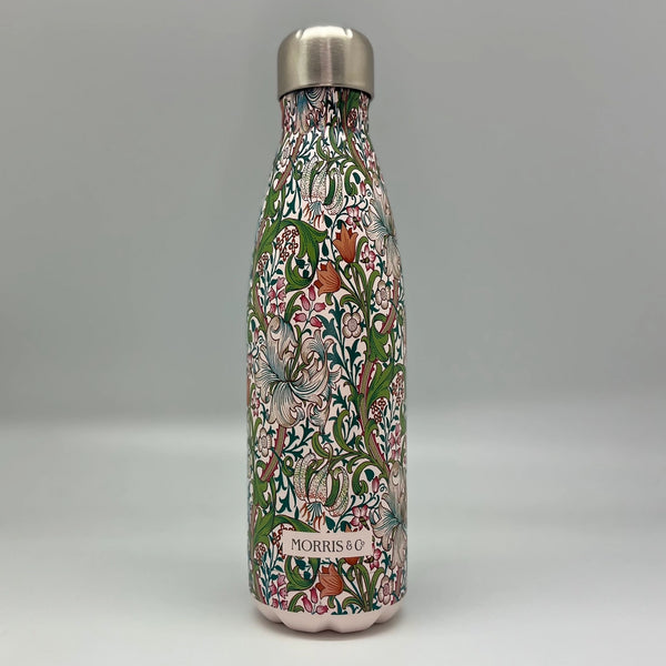 Decorative water bottle with floral pattern on a gray background