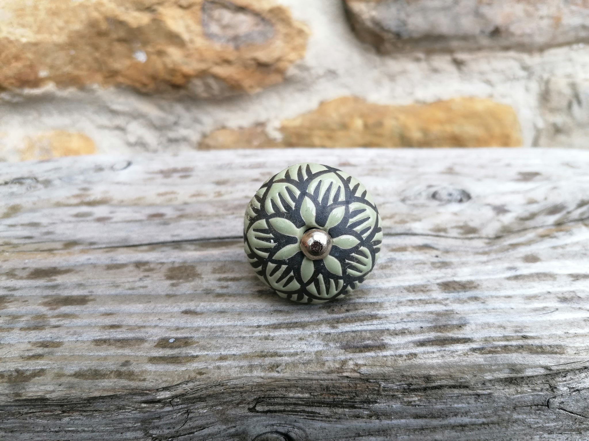 Ceramic Doorknob with Black Flower
